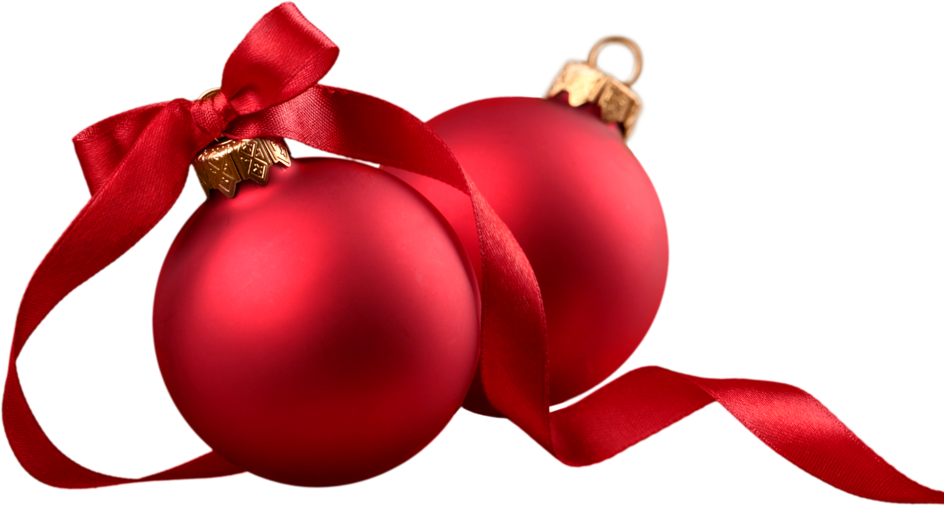 Two red Christmas baubles with gold hooks and a red bow ribbon, festive holiday decorations.